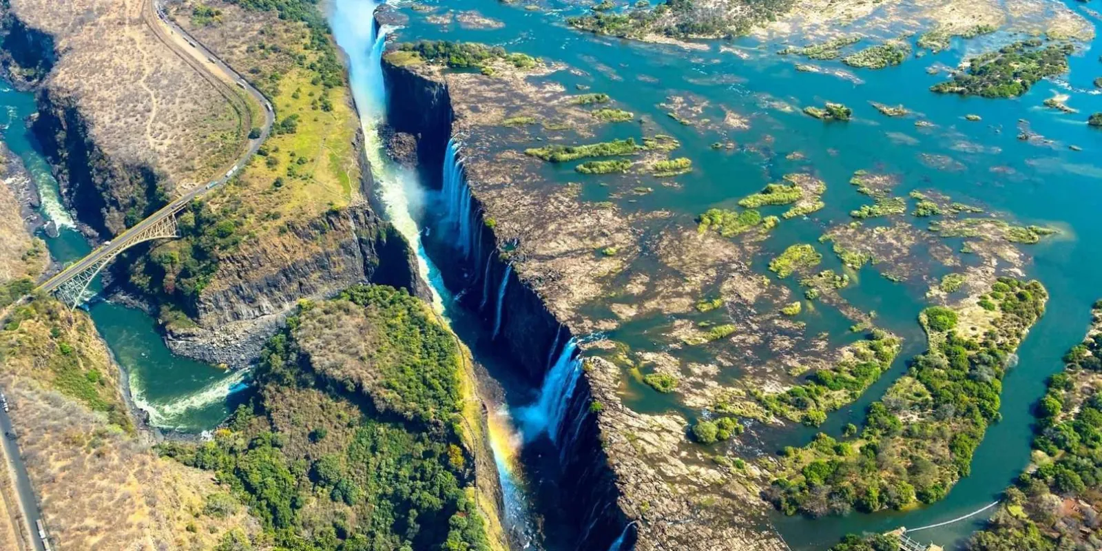 Victoria Falls lounge access tour — departure briefing and boarding at the private helipad